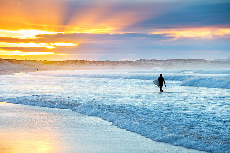 Surfer at sunset