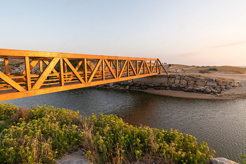 Wooden bridge in Areia Branca Beach in Lourinha