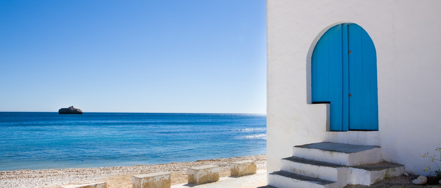 Blue Door in Portichol Cove